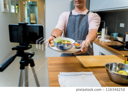 The chef is broadcasting live from workshop how to prepare a vegetarian food The chef is broadcasting live from workshop how to prepare a vegetarian food 116348258