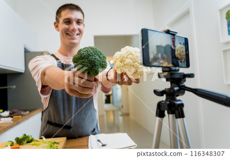 The chef is broadcasting live from workshop how to prepare a vegetarian lentils soup The chef is broadcasting live from workshop how to prepare a vegetarian lentils soup 116348307