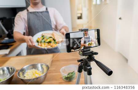 The chef is broadcasting live from workshop how to prepare a vegetarian food The chef is broadcasting live from workshop how to prepare a vegetarian food 116348356