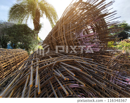 Metal bars arranged stack at the construction site 116348367