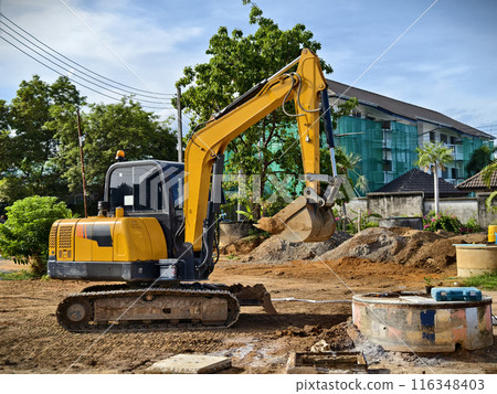 Large excavator are working at the construction site Large excavator are working at the construction site 116348403
