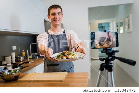 The chef is broadcasting live from workshop how to prepare a buckwheat pasta with lentils The chef is broadcasting live from workshop how to prepare a buckwheat pasta with lentils 116348472