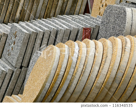 A collection of concrete tile is arranged on one another 116348535