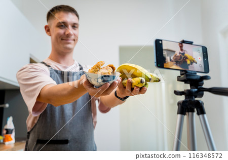 The chef is broadcasting live from workshop how to prepare a crispy fried bananas The chef is broadcasting live from workshop how to prepare a crispy fried bananas 116348572