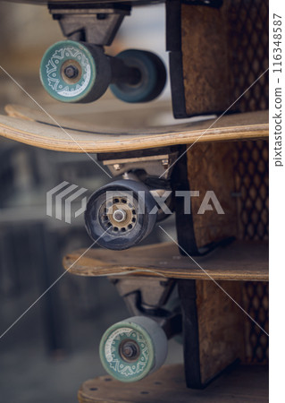 A stack of skateboards on a special outdoor stand A stack of skateboards on a special outdoor stand 116348587