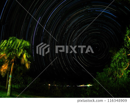Star trails and night view from the garden of a seaside lodge Star trails and night view from the garden of a seaside lodge 116348909