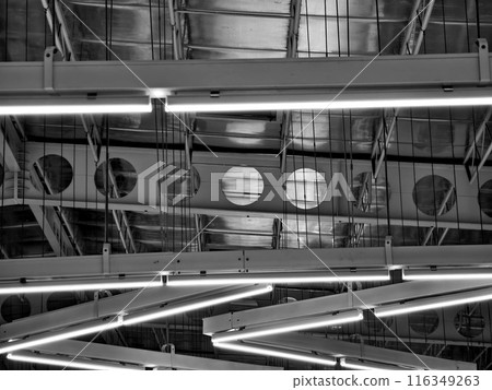 Ceiling with pipes is beautifully decorated with many industrial lamps Ceiling with pipes is beautifully decorated with many industrial lamps 116349263