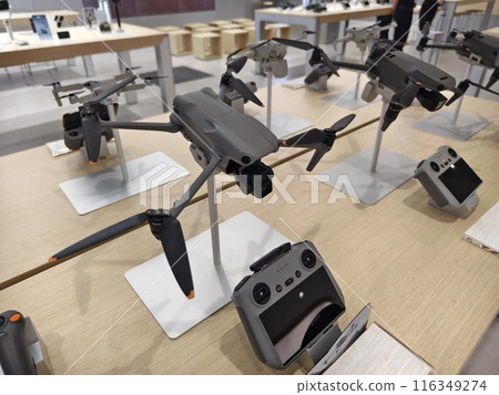Modern drone for video and photo in the light store Modern drone for video and photo in the light store 116349274