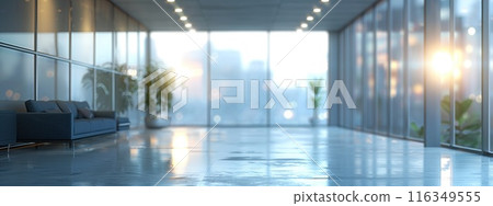 A large, empty room with a couch and a potted plant 116349555