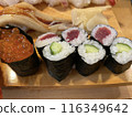 [Sushi/Seafood] Nigiri sushi and gunkan platter served on sushi sandals (salmon roe, tuna rolls, and kappa rolls) 116349642