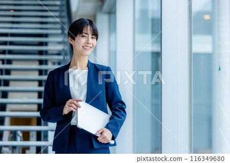 Young business woman in the office 116349680