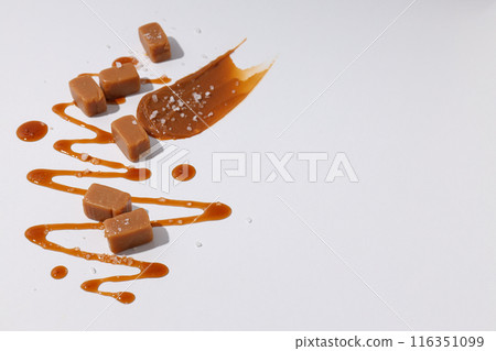 Cubes of salted caramel on a white background Cubes of salted caramel on a white background 116351099