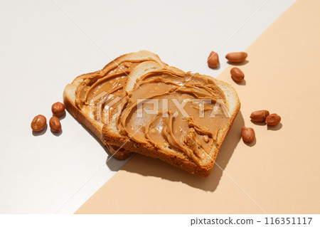 Sandwiches with peanut paste, on a light background. 116351117