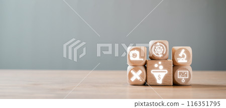 Wooden blocks with digital icons illustrating conversion rate optimization, business growth, and marketing strategies on a wooden table. 116351795