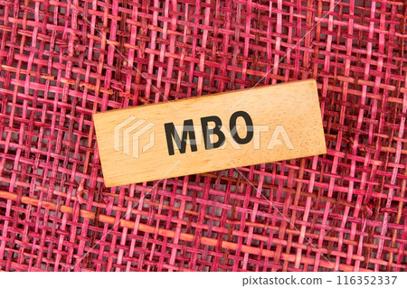 The letters MBO It is an abbreviation for Management by Objectives. MBO on wooden blocks, conceptual photo 116352337