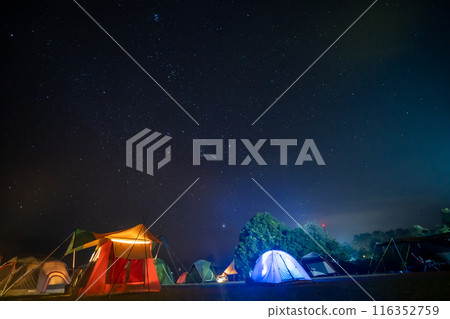travel and people activity concept with star in the night with camping tent 116352759