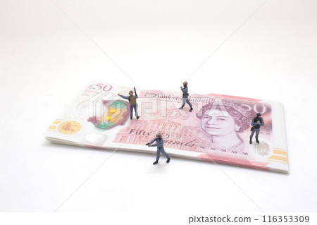 the FINANCE concept, money with green soldiers the FINANCE concept, money with green soldiers 116353309