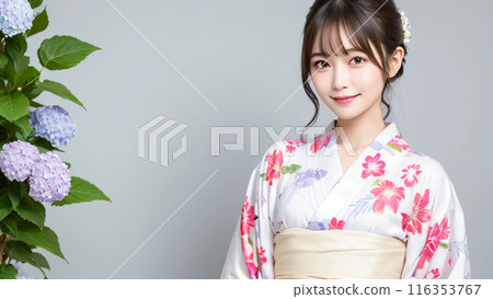A young woman in a yukata with hydrangeas 116353767