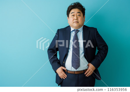 A businessman with a protruding belly 116353956
