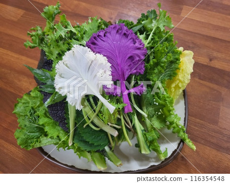 korea wrapped in leaves of lettuce, vegetables korea wrapped in leaves of lettuce, vegetables 116354548