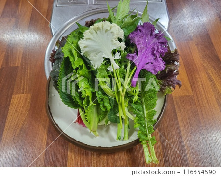 korea wrapped in leaves of lettuce, vegetables korea wrapped in leaves of lettuce, vegetables 116354590