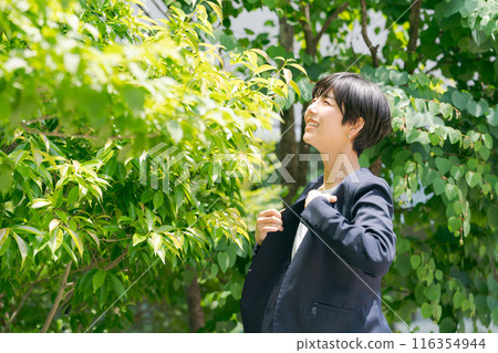 A woman in a suit who looks hot 116354944