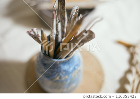 Close up Tools for forming clay on background 116355422