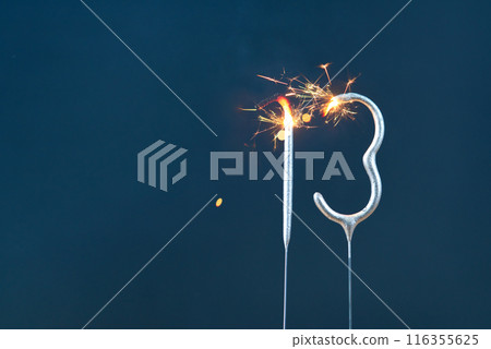 13 years celebration festive background made with Bengal fires in the form of number Thirteen. 13 years celebration festive background made with Bengal fires in the form of number Thirteen. 116355625
