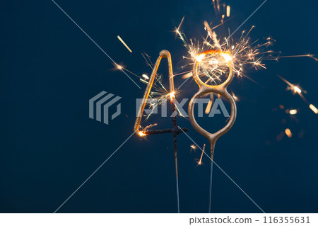 48 years celebration festive background made with Bengal fires in the form of number Forty-eight. 48 years celebration festive background made with Bengal fires in the form of number Forty-eight. 116355631