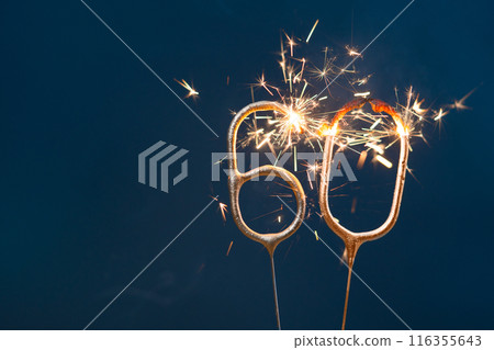 60 years celebration festive background made with Bengal fires in the form of number Sixty. 116355643