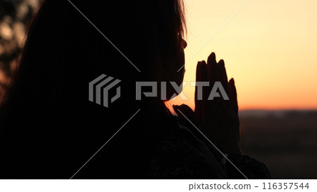 girl woman praying at sunset, hand sunset faith pain, asking heaven for help, girl sunset contemplation, silent prayer silhouette, sunset spiritual practice, evening devotion calm, girl meditating 116357544