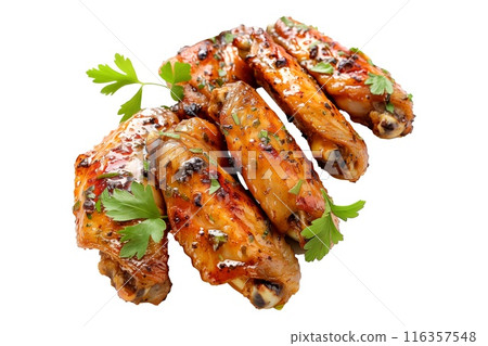 Delicious crispy Cajun chicken wings garnished with fresh cilantro, great for appetizers or main meals Delicious crispy Cajun chicken wings garnished with fresh cilantro, great for appetizers or main meals 116357548