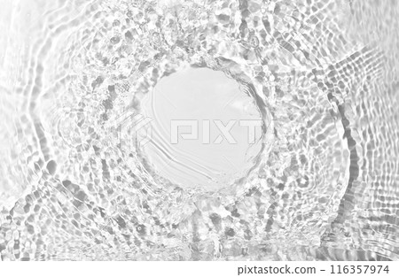 Cosmetic product presentation mockup featuring an empty circle on a water surface with splashes. Perfect for emphasizing freshness and natural purity in product placement Cosmetic product presentation mockup featuring an empty circle on a water surface with splashes. Perfect for emphasizing freshness and natural purity in product placement 116357974