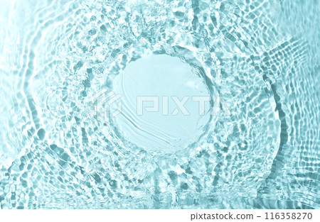 Cosmetic product presentation mockup scene made with empty circle place on water surface made with splashes. Ideal for product placement with an emphasis on freshness and natural purity. 116358270