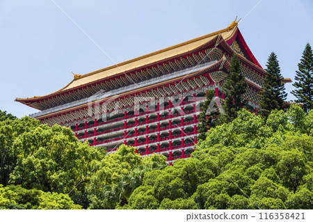 Low angle view of the Grand Hotel Taipei on a sunny day in Taiwan. This is a Magnificent Chinese-style palace building. Low angle view of the Grand Hotel Taipei on a sunny day in Taiwan. This is a Magnificent Chinese-style palace building. 116358421