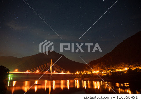 Fantastic night scenery of Lake Tanzawa, illuminated, starry sky 116358451