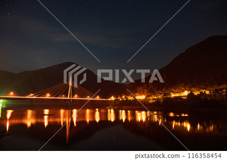 Fantastic night scenery of Lake Tanzawa, illuminated, starry sky 116358454