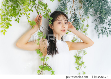 Fashion portrait of a woman wearing a dress 116358678