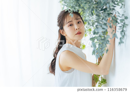 Fashion portrait of a woman wearing a dress 116358679