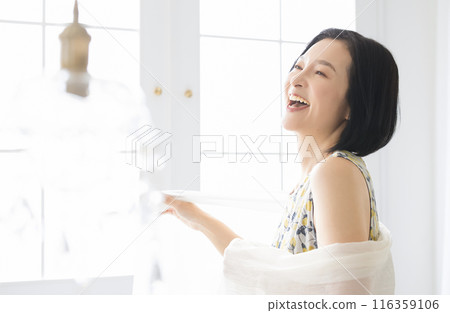 A woman with a smile A woman with a smile 116359106