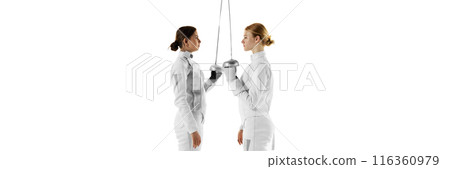 Banner. Two fencers face each other, their blades crossed in moment of mutual respect and competition against white studio background with negative space to insert text. 116360979