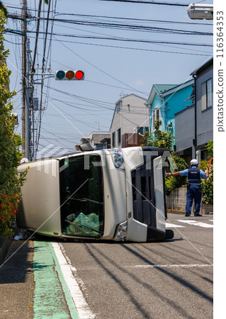 Cars collided and overturned at an intersection 116364353