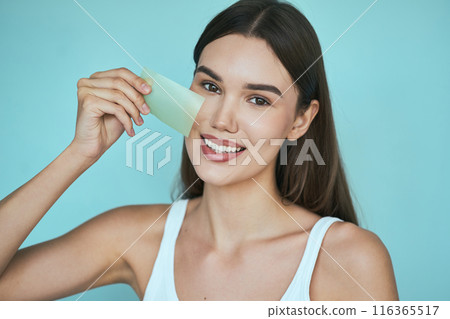 Skin Care. Young Woman Using Matting Wipes for Skincare Routine 116365517