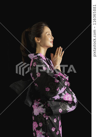 Woman in black yukata for black background compositing 116365881
