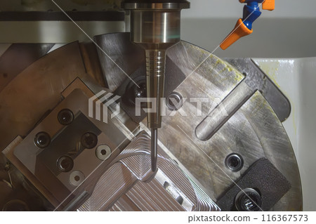 The 5-axis CNC milling machine  cutting the automotive part with solid ball end mill tool. 116367573