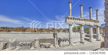 View of the historic ruined city of Pompeii in Italy with the volcano Vesuv View of the historic ruined city of Pompeii in Italy with the volcano Vesuv 116367690