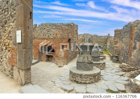 View of the historic ruined city of Pompeii in Italy with the volcano Vesuv View of the historic ruined city of Pompeii in Italy with the volcano Vesuv 116367706