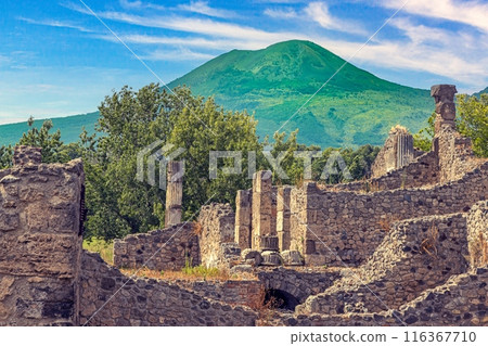 View of the historic ruined city of Pompeii in Italy with the volcano Vesuv View of the historic ruined city of Pompeii in Italy with the volcano Vesuv 116367710