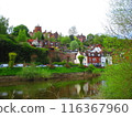 A riverside village surrounded by nature 116367960