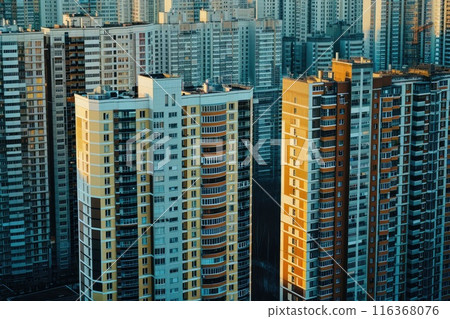 Multi-storey buildings with apartments. Construction of a new residential complex and new buildings. City district. Real estate concept Multi-storey buildings with apartments. Construction of a new residential complex and new buildings. City district. Real estate concept 116368076